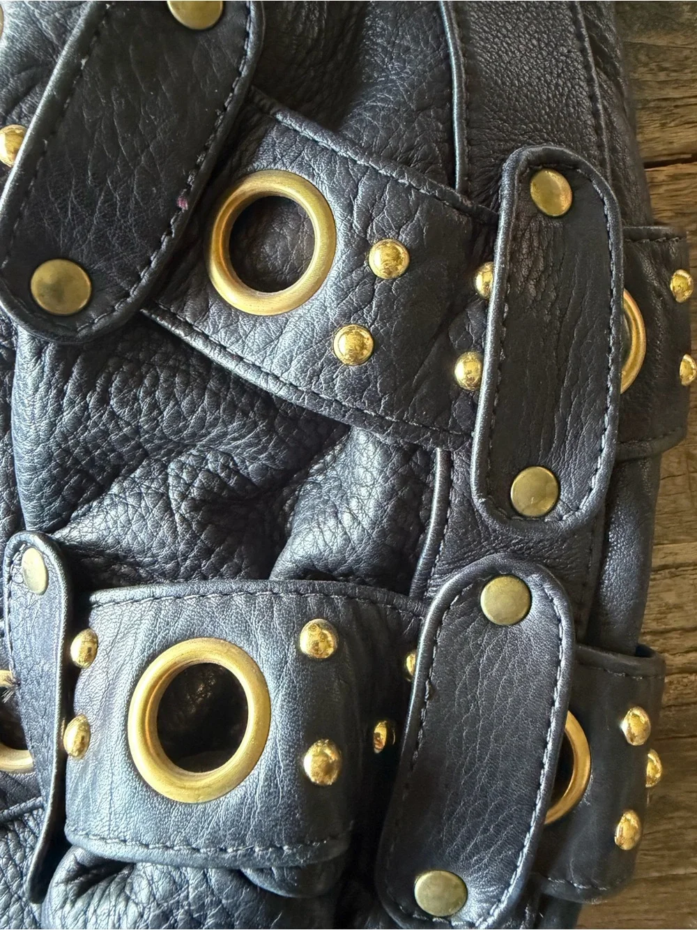 Black Leather Hobo Bag with Gold Grommet Detail